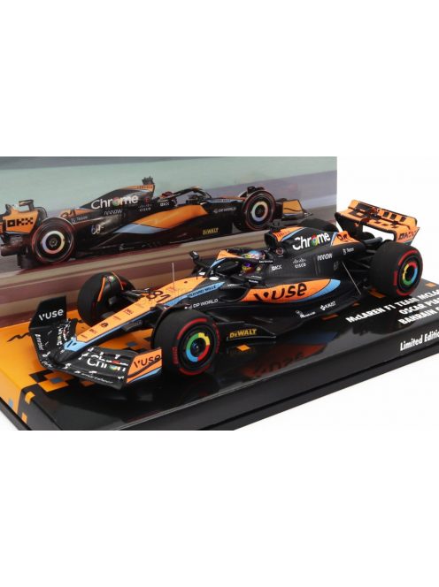 Minichamps - McLAREN F1  MCL60 TEAM McLAREN N 81 BAHRAIN GP 2023 OSCAR PIASTRI ORANGE BLUE BLACK